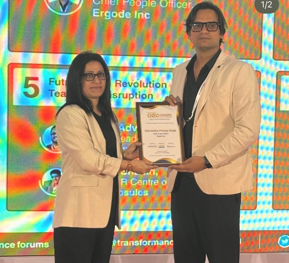 Receiving recognition at a PeopleTech summit